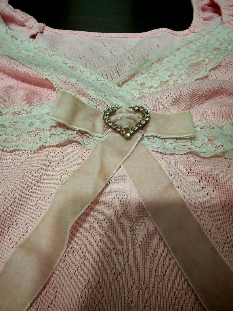 Coquette top with heart shape pendant💕 (Category: Shirts) located in Bulacan. Submitted by ierwenyarnz (Listing ID 1470161703, Image 2). Description: ⚠️PLEASE READ DESCRIPTION • Size: M to L •Price is set •Be aware that the tops I sell are thrifted, or pre-loved and so, there will be signs of use but I will always point it out for you. •Shipping through J&T Express.