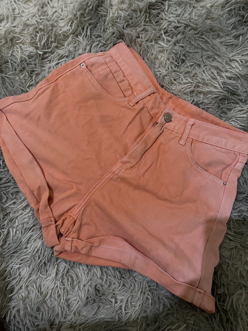 Coral pink cuffed denim shorts (Category: Shorts) located in Navotas City. Submitted by zhahanna (Listing ID 1470273367, Image 1). Description: - Color: Vibrant bright coral pink - Fit: High-waisted with front button closure and belt loops - waist: 26-27.