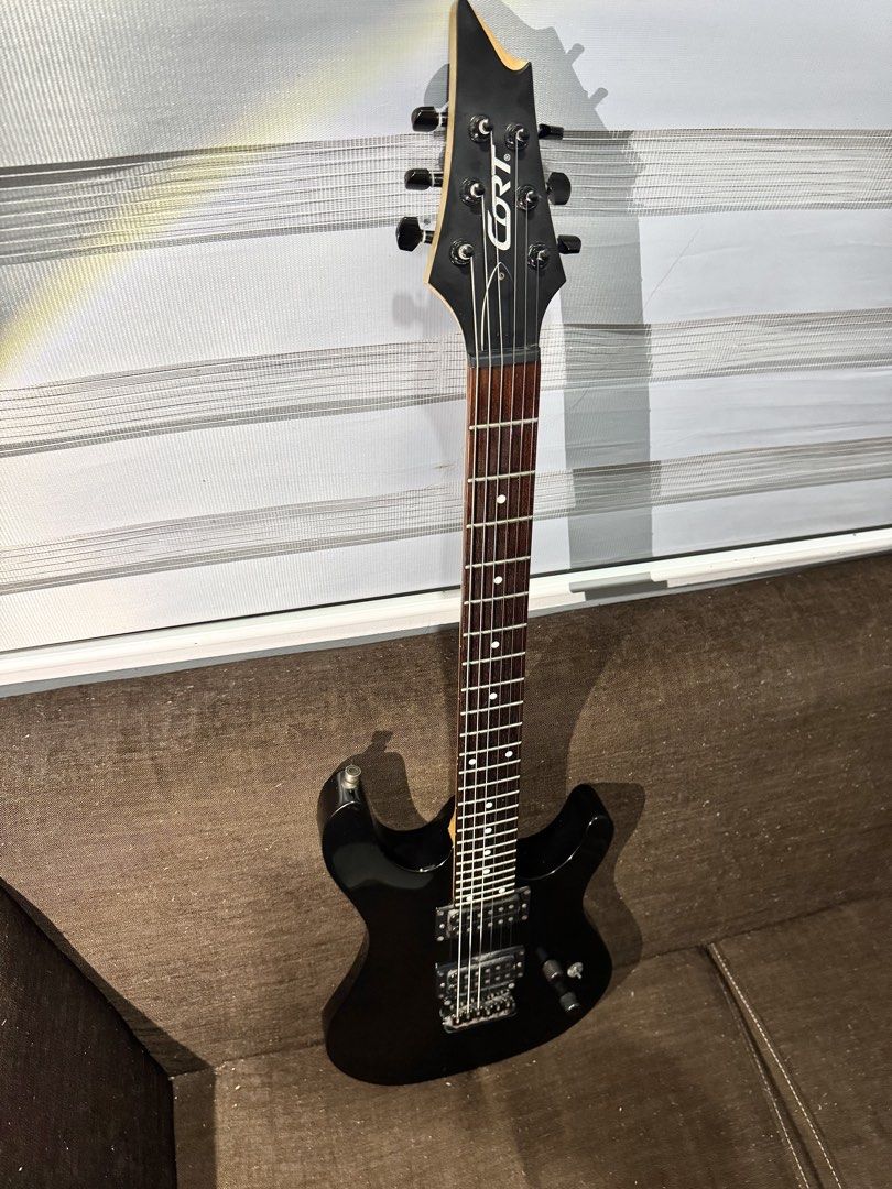 Cort KX100 ( Electric Guitar ) (Category: Musical Instruments) located in Manila. Submitted by tonedistrict.co (Listing ID 1470246422, Image 3). Description: RUSH SALE paunahan!! Cort KX100 🎱 7,200 only COLOR- Metallic Black ~SPECS~ Body Material- Nyatoh Neck Material- Hard Maple Fingerboard Material- Jatoba Number of frets -24 Frets Bridge- Hardtail Tuning Machine- Die-Cast Pickups- Cort® Powersound Pickup Set issue minimal hairline/paint chip 