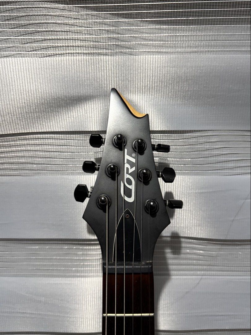 Cort KX100 ( Electric Guitar ) (Category: Musical Instruments) located in Manila. Submitted by tonedistrict.co (Listing ID 1470246422, Image 2). Description: RUSH SALE paunahan!! Cort KX100 🎱 7,200 only COLOR- Metallic Black ~SPECS~ Body Material- Nyatoh Neck Material- Hard Maple Fingerboard Material- Jatoba Number of frets -24 Frets Bridge- Hardtail Tuning Machine- Die-Cast Pickups- Cort® Powersound Pickup Set issue minimal hairline/paint chip 