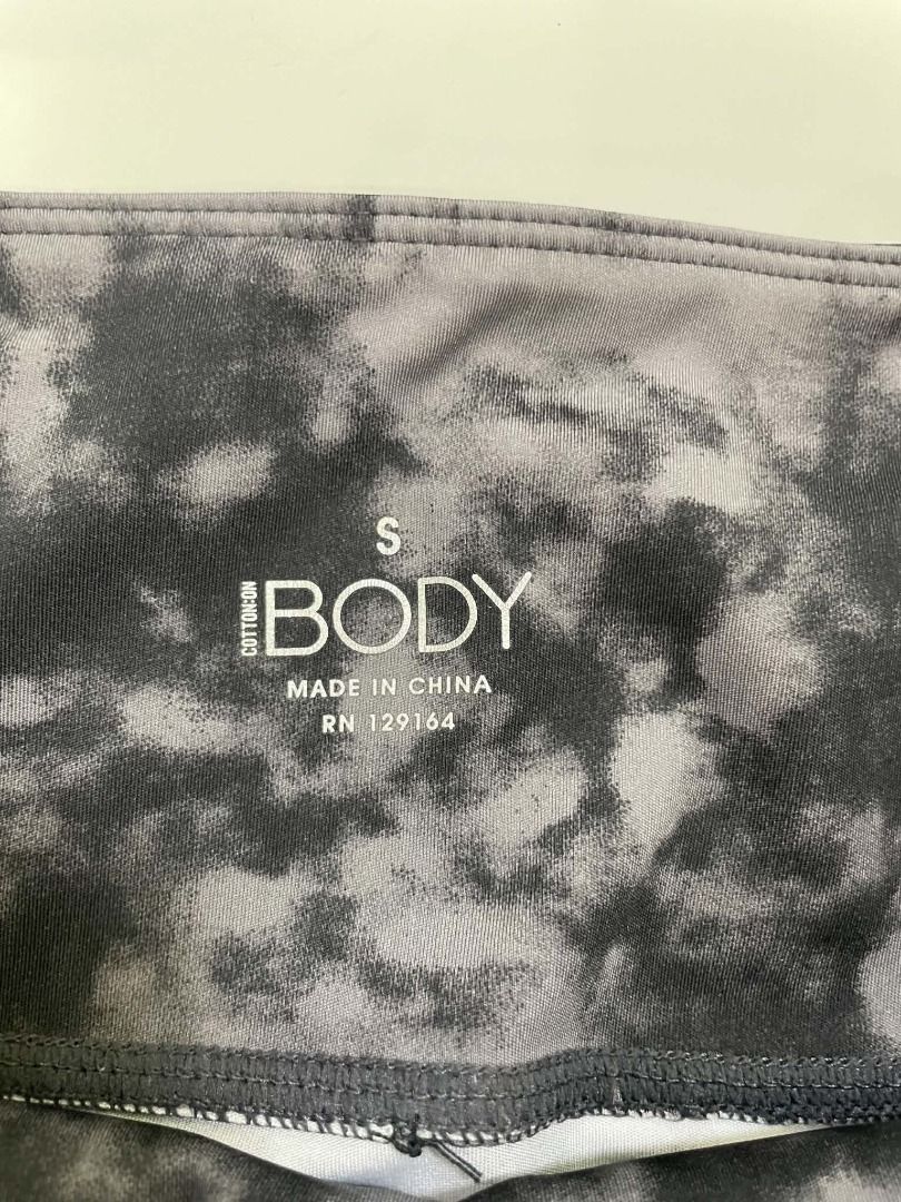 Cotton On Body Tie-Dye Active Shorts (Category: Shorts) located in Quezon City. Submitted by revivingstuff (Listing ID 1470223524, Image 3). Description: - Brand: Cotton On Body - Style: Active shorts in grey and black tie-dye print - Size: S - Fit: High-waisted with stretchy, super comfortable fabric - Features: Convenient side pockets for phone or keys - Condition: Great pre-loved condition.