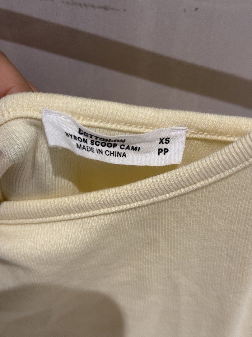 Cotton on Tank Top (Category: Sleeveless) located in Makati City. Submitted by josbd (Listing ID 1470336298, Image 2). Description: Yellow Tank Top from Cotton on Size XS Brand new.