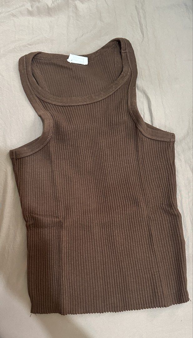 Cotton Ribbed Tank Top (Take All) (Category: Sleeveless) located in Manila. Submitted by rf0415 (Listing ID 1470165839, Image 2). Description: - 4-piece ribbed tank top set (White, Black, Brown, Beige) - Classic racerback cut - Size XXS fits Xs-Small - Sold as a bundle.