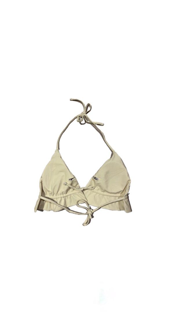 Cream Ruffled Triangle Bikini Top with Halter Neck Ties (Category: Bikinis & Swimsuits) located in Koronadal. Submitted by keenpenguin_6af0c6 (Listing ID 1470149045, Image 2). Description: - Color: Cream / Neutral solid shade - Style: Minimalist triangle bikini top with cute ruffled hem - Straps: Adjustable halter neck ties - Details: Front drawstring ties and side slits on each cup - Material: Lightweight, comfortable beachwear fabric - Conditio