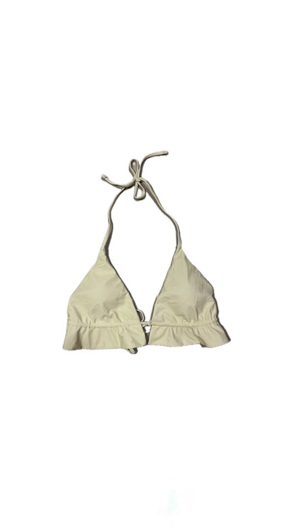 Cream Ruffled Triangle Bikini Top with Halter Neck Ties (Category: Bikinis & Swimsuits) located in Koronadal. Submitted by keenpenguin_6af0c6 (Listing ID 1470149045, Image 1). Description: - Color: Cream / Neutral solid shade - Style: Minimalist triangle bikini top with cute ruffled hem - Straps: Adjustable halter neck ties - Details: Front drawstring ties and side slits on each cup - Material: Lightweight, comfortable beachwear fabric - Conditio