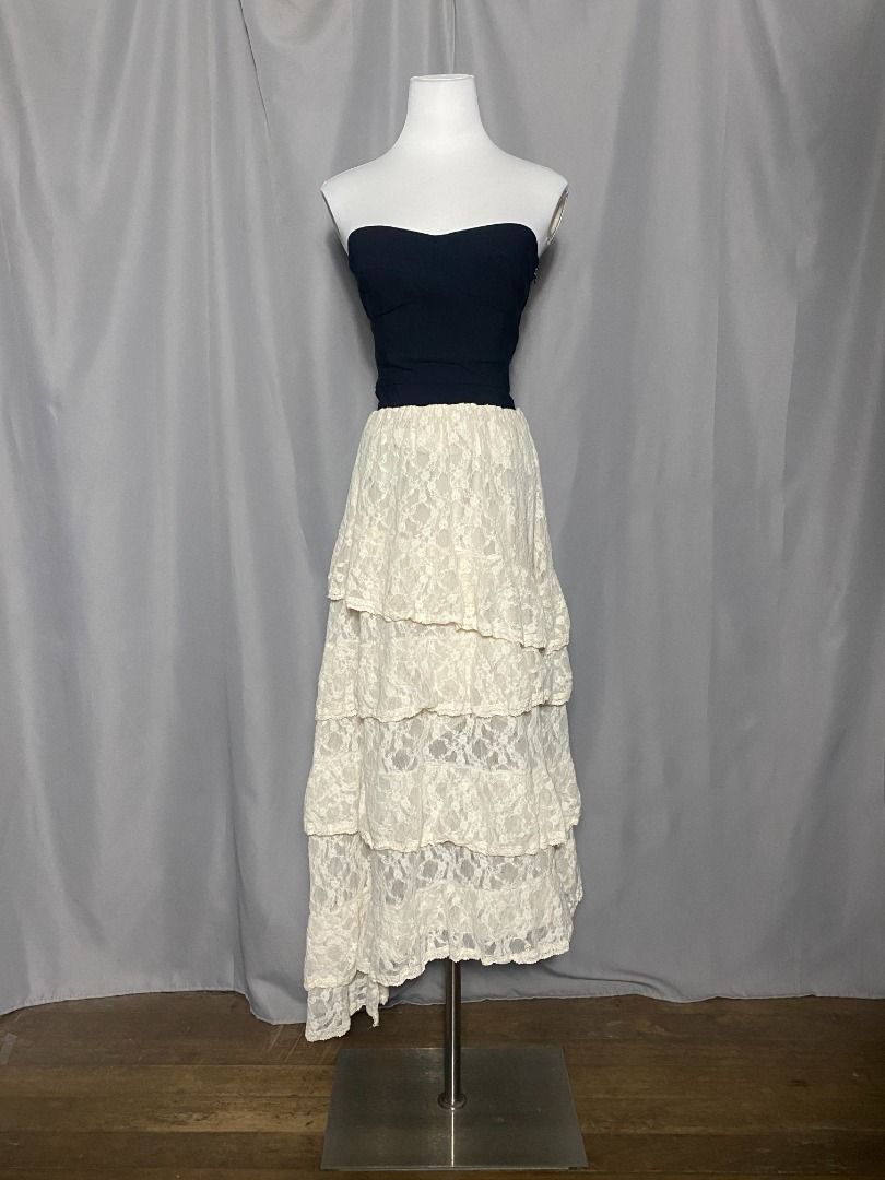 Cream tiered lace asymmetrical skirt (Category: Skirts) located in Las Pinas. Submitted by ipickyou (Listing ID 1470291346, Image 2). Description: Unwashed Condition: 10/10 𝗠𝗲𝗮𝘀𝘂𝗿𝗲𝗺𝗲𝗻𝘁𝘀 𝘄𝗵𝗲𝗻 𝗹𝗮𝗶𝗱 𝗳𝗹𝗮𝘁: -Waist: 13-21” -Length: 31-38” .