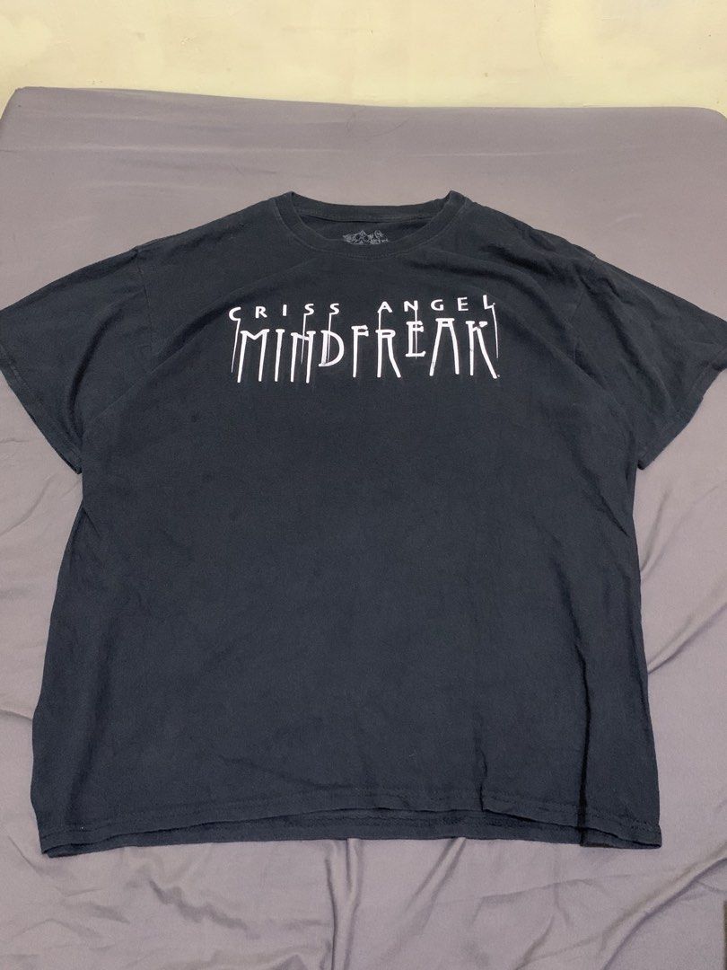 Criss Angel mindFreak (Category: Tshirts & Polo Shirts ) located in Roxas City. Submitted by vaultcultureco. (Listing ID 1470288531, Image 2). Description: - Brand: MF Apparel / Criss Angel Mindfreak - Color: Black with white graphic print - Size: XL - Material: 100% Cotton - Condition: 7/10 (pre-owned with light vintage wear) - Features iconic Mindfreak logo and branded inner neck tag.