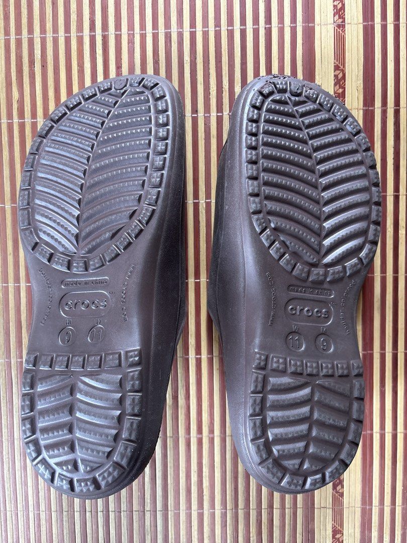 Crocs Brown Slide Sandals Size M9/W11 (Category: Slippers and slides) located in Pasig City. Submitted by coolphoenix-29ac (Listing ID 1470184226, Image 3). Description: - Brand: Crocs - Style: Slide sandals with cutout details and textured footbed - Condition: Brand new with original store tag attached - Color: Brown - Size: Men's 9 / Women's 11 - Origin: Made in China - Slip-on design for easy wear.