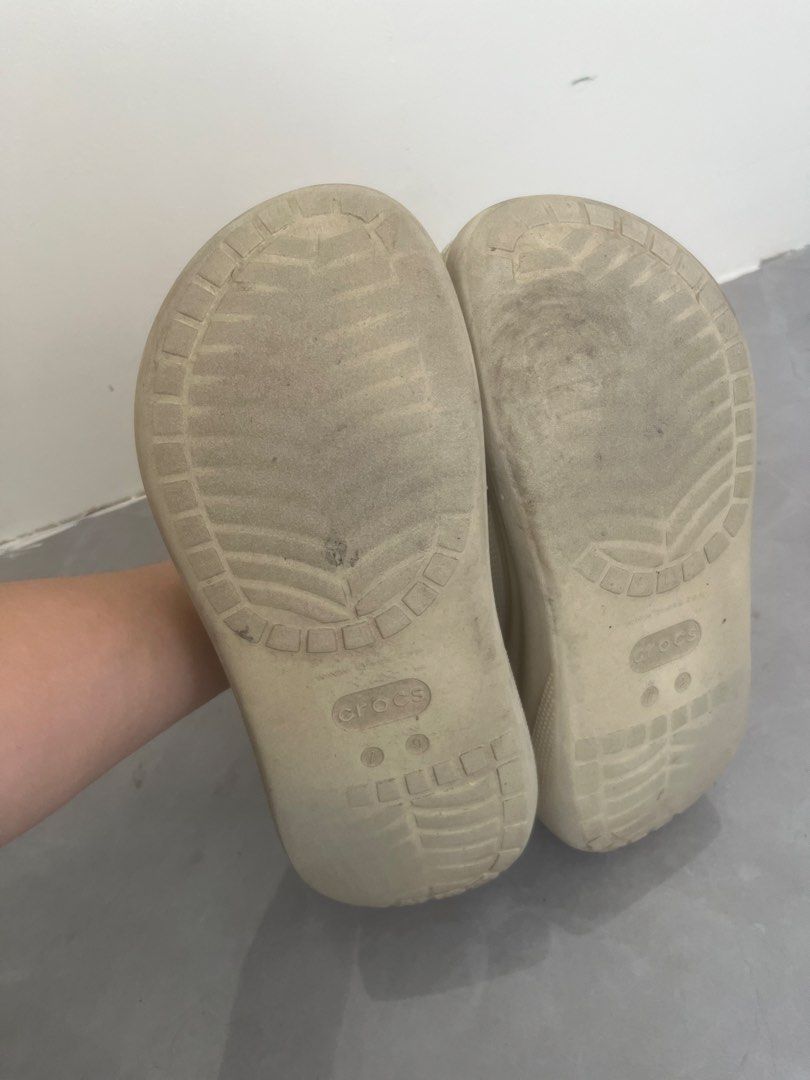 Crocs Classic Crush Clog Bone Off-White Platform Sandals (Category: Sandals) located in Bulacan. Submitted by jhemieee (Listing ID 1470191178, Image 3). Description: - Color: Bone - Size (7-Men) (9- Wmn) - Style: Classic Crush Clog with chunky platform sole - Comfort: Iconic Crocs comfort footbed and adjustable heel strap - Breathability: Ventilation ports on top and around the midsole - Condition: Regular signs of wear on soles and sides from no