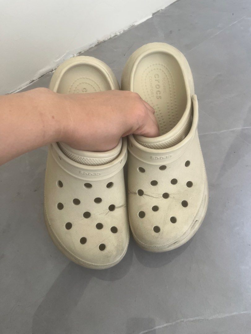 Crocs Classic Crush Clog Bone Off-White Platform Sandals (Category: Sandals) located in Bulacan. Submitted by jhemieee (Listing ID 1470191178, Image 2). Description: - Color: Bone - Size (7-Men) (9- Wmn) - Style: Classic Crush Clog with chunky platform sole - Comfort: Iconic Crocs comfort footbed and adjustable heel strap - Breathability: Ventilation ports on top and around the midsole - Condition: Regular signs of wear on soles and sides from no