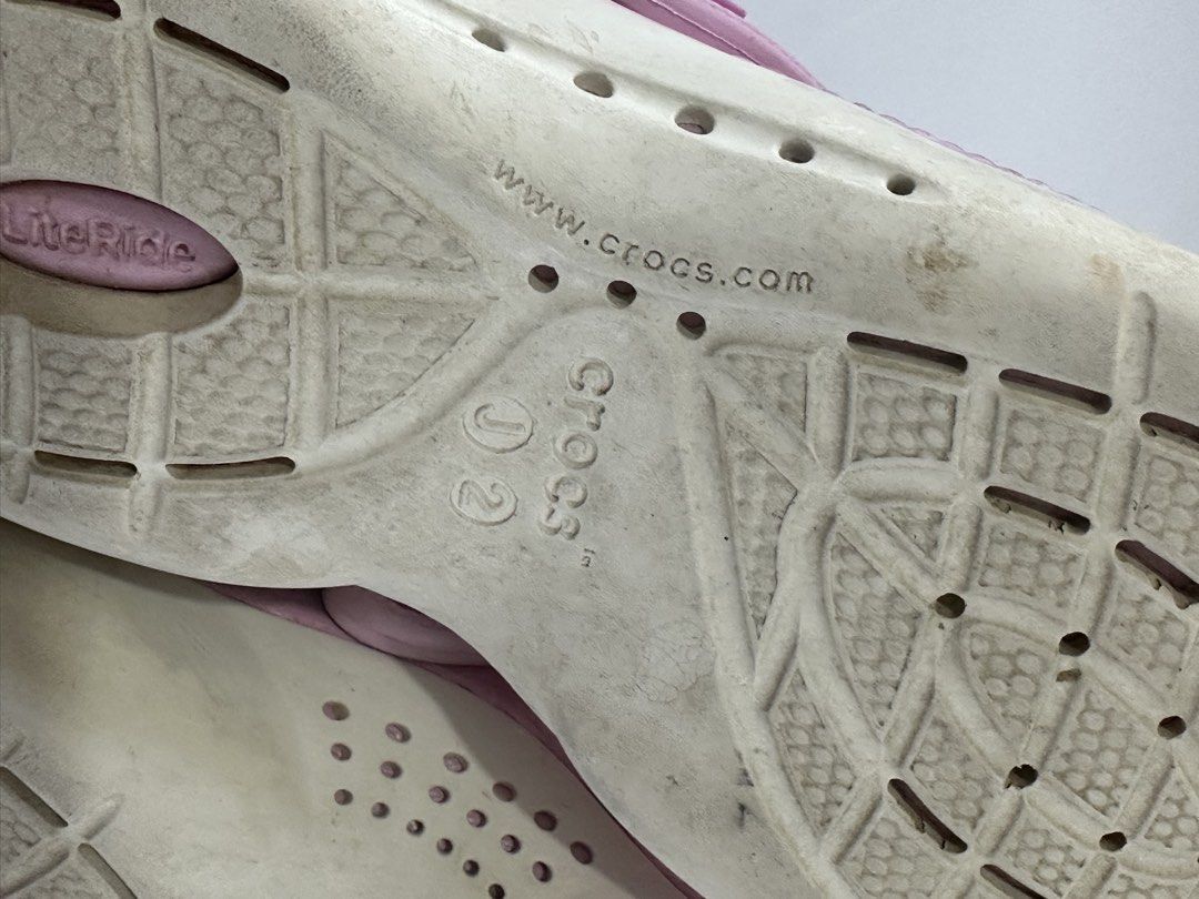 Crocs LiteRide Pink Clogs Size J2 (Category: Babies & Kids Fashion) located in Apalit. Submitted by mintymatcha (Listing ID 1470150364, Image 3). Description: - Authentic Pink Crocs LiteRide Clogs - Size: J2 stamped on bottom (Interior measures approx. 20-21 cm) - Comfort: Super soft LiteRide foam footbed for all-day wear - Condition: in Great condition. Pre-owned with some dirt and wear on the soles..
