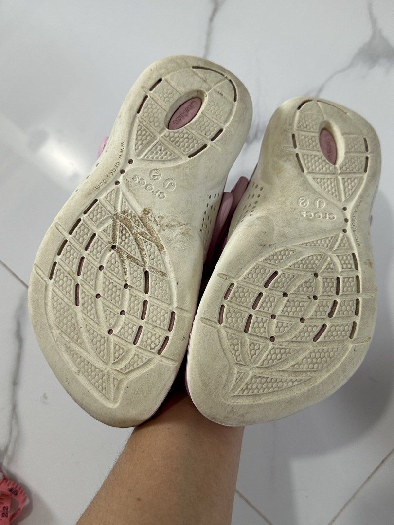 Crocs LiteRide Pink Clogs Size J2 (Category: Babies & Kids Fashion) located in Apalit. Submitted by mintymatcha (Listing ID 1470150364, Image 2). Description: - Authentic Pink Crocs LiteRide Clogs - Size: J2 stamped on bottom (Interior measures approx. 20-21 cm) - Comfort: Super soft LiteRide foam footbed for all-day wear - Condition: in Great condition. Pre-owned with some dirt and wear on the soles..
