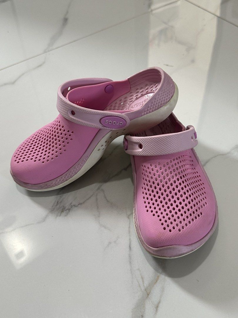 Crocs LiteRide Pink Clogs Size J2 (Category: Babies & Kids Fashion) located in Apalit. Submitted by mintymatcha (Listing ID 1470150364, Image 1). Description: - Authentic Pink Crocs LiteRide Clogs - Size: J2 stamped on bottom (Interior measures approx. 20-21 cm) - Comfort: Super soft LiteRide foam footbed for all-day wear - Condition: in Great condition. Pre-owned with some dirt and wear on the soles..