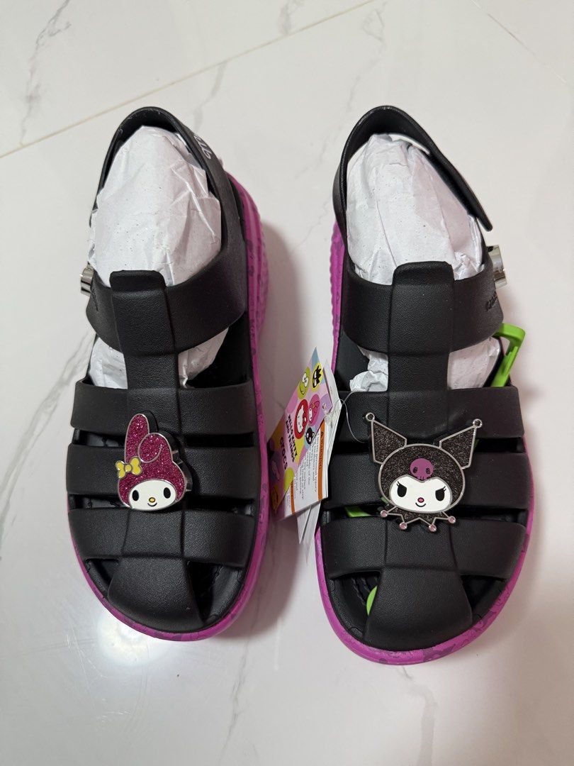 Crocs Melody × Kuromi Wedge Stomp Sandals (Category: Wedges) located in Angeles City. Submitted by missluxxe888 (Listing ID 1470348375, Image 2). Description: -Cute Melody × Kuromi wedge sandals - Ultra lightweight and water-friendly - Wedge heel for comfort and style - Durable and long-lasting - Adorable 3D Melody and Kuromi charms included - Non-slip sole for safety - Easy to clean.
