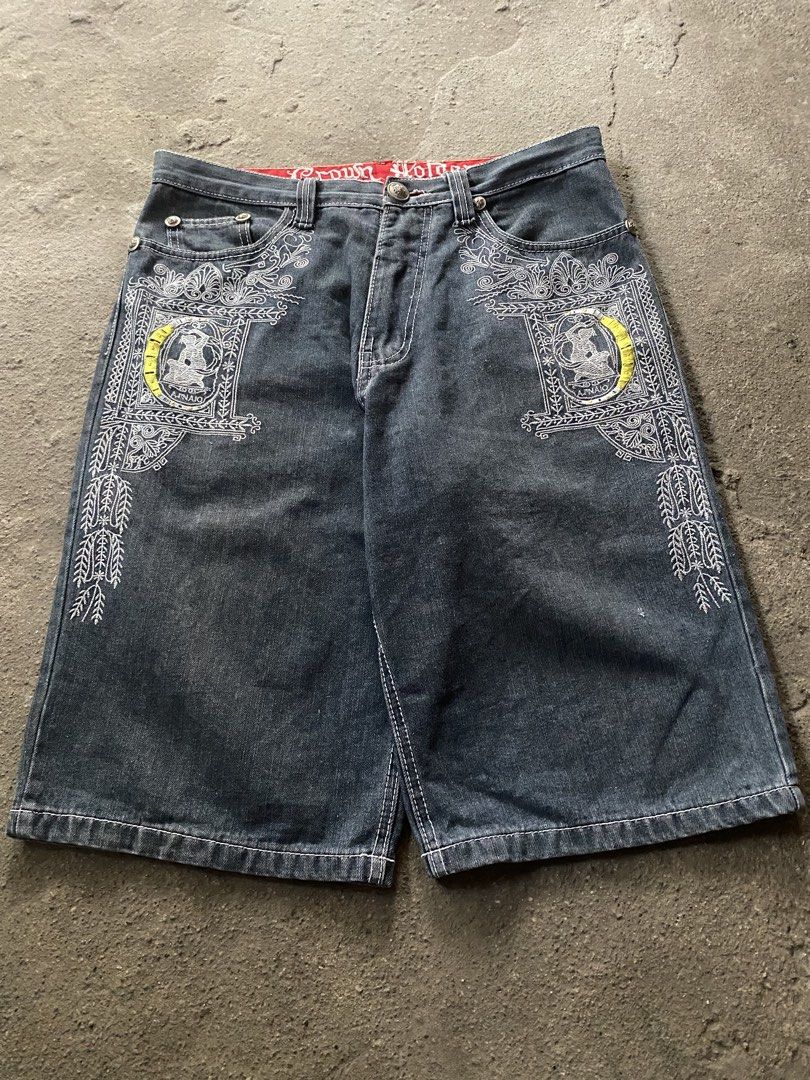 Crown Holder Embroidered Denim Jorts Y2K (Category: Shorts) located in Caloocan City. Submitted by remythrift (Listing ID 1470188348, Image 1). Description: - Brand/Model: Crown Holder denim jorts - Wash: Dark wash - Details: Heavy white and yellow embroidery on front panels and back waistband, detailed stitching on back pockets - Lining: Red inner waistband lining - Condition: Minor fraying and small repair near the hem and button area - Style: 