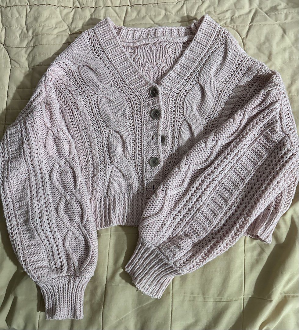 Cute Pink Knitted Sweater (Category: Coats, Jackets and Outerwear) located in Quezon City. Submitted by hennessyscloset (Listing ID 1470148127, Image 2). Description: Preloved pink knitted sweater. No flaws or defect, just signs of usage. Free size but can fit XS-Medium Rfs: Decluttering.