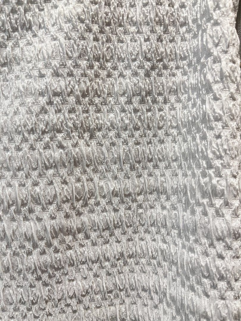 Cute White textured sleeveless tank top (Category: Sleeveless) located in Manila. Submitted by declutwtlu_ (Listing ID 1470261547, Image 3). Description: - Color: White - Size: S (Multi-region) - Material/Pattern: Textured crinkle - Fit: Fitted cut with crew neckline - Origin: Made in Vietnam - Versatile basic piece, great for layering or wearing on its own.