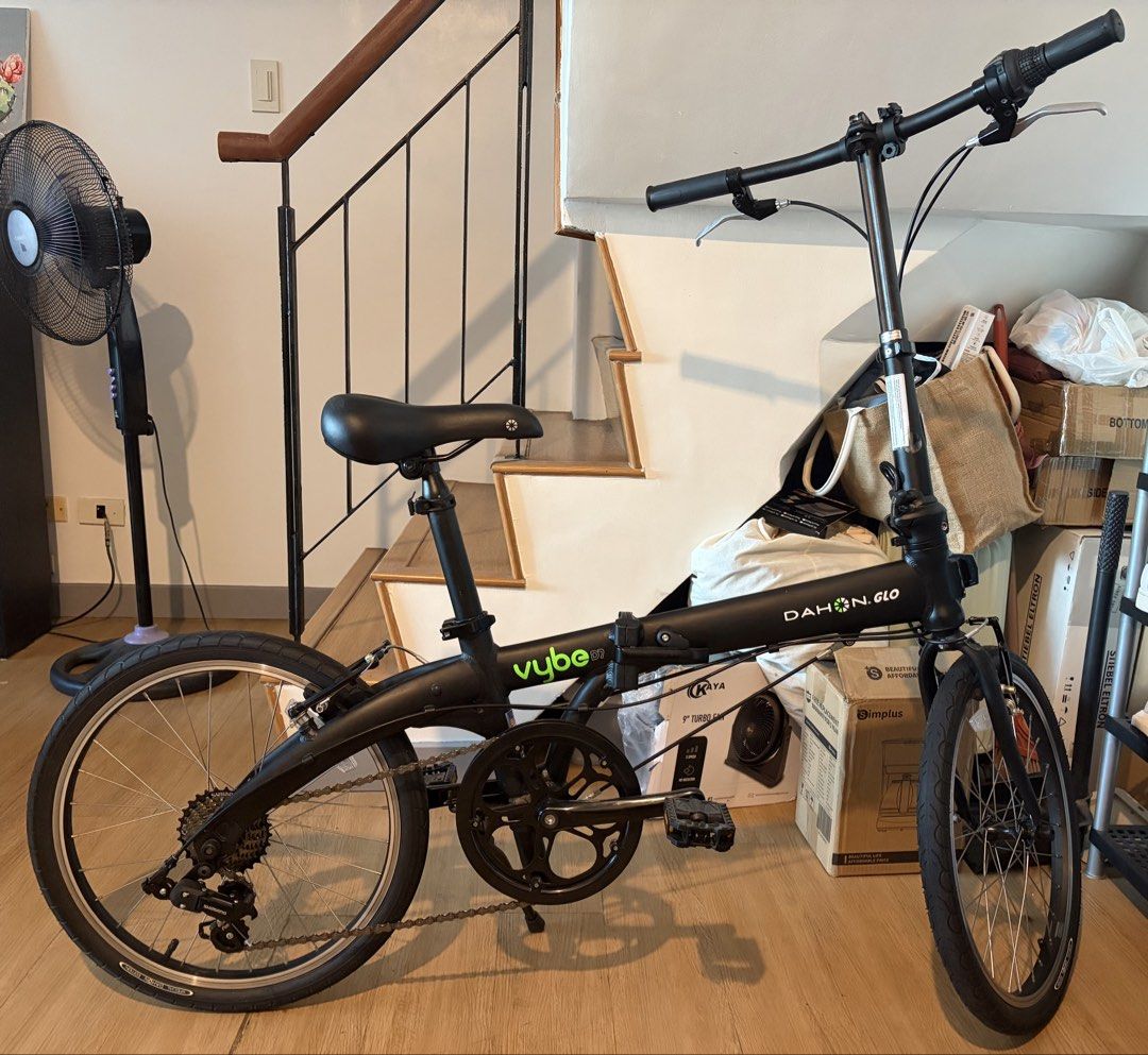 Dahon Vybe D7 Folding Bike - Black (Category: Bicycles) located in Mandaluyong City. Submitted by jdigitalfinds (Listing ID 1470142479, Image 1). Description: - Model: Dahon Vybe D7 Folding Bike - Color: Matte Black - Gears: Shimano 7-speed with right twist shifter - Brakes: Standard V-brakes - Extras: Front reflector - Portability: Folds down easily for compact storage and commuting - Condition: Clean frame and tires with minimal wear - RFS: Dec