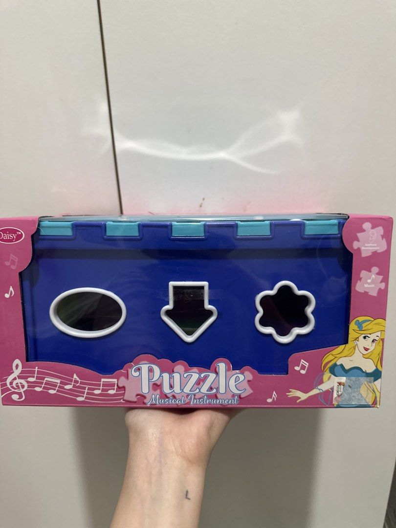 Daisy Puzzle Musical Instrument Toy Box (Category: Educational & Learning Toys) located in Manila. Submitted by ltncngco (Listing ID 1470161872, Image 2). Description: - Daisy puzzle musical instrument toy set - Great educational toy for kids to play and learn - Note: Box shows minor wear from storage .