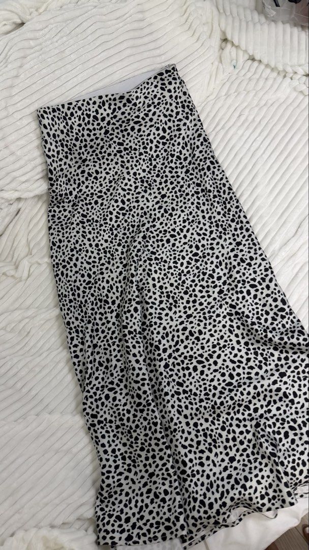 Dalmatian Print Midi Skirt with Side Zip (Category: Skirts) located in Rizal. Submitted by kianapreloves (Listing ID 1470237560, Image 2). Description: - Trendy black and white dalmatian animal print - Smooth, high-quality fabric with a flattering high-waisted fit - Hits right around mid-calf length - Concealed side zipper for a seamless look - Clean waistline with a structured inner band for extra comfort.