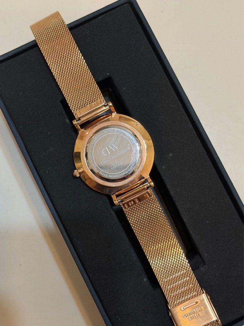 Daniel Wellington Rose Gold Mesh Watch with Box (Category: Women's Watches) located in Bacolod City. Submitted by henna_preloved (Listing ID 1470145490, Image 3). Description: - Brand: Daniel Wellington - Color: Rose Gold - Strap: Mesh strap - Dial: Classic round with minimalist markers - Back: Stainless steel - Inclusion: Original black presentation box - Condition: Great for daily wear or formal events -.