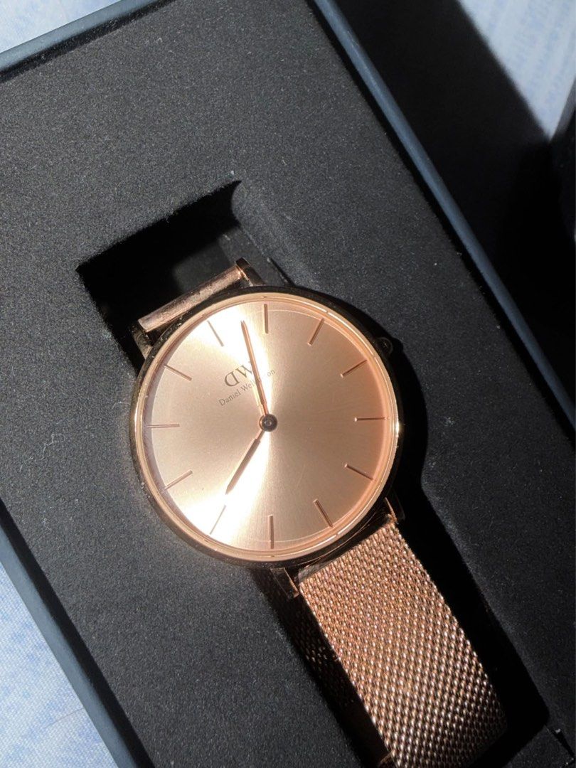 Daniel Wellington Rose Gold Mesh Watch with Box (Category: Women's Watches) located in Bacolod City. Submitted by henna_preloved (Listing ID 1470145490, Image 2). Description: - Brand: Daniel Wellington - Color: Rose Gold - Strap: Mesh strap - Dial: Classic round with minimalist markers - Back: Stainless steel - Inclusion: Original black presentation box - Condition: Great for daily wear or formal events -.