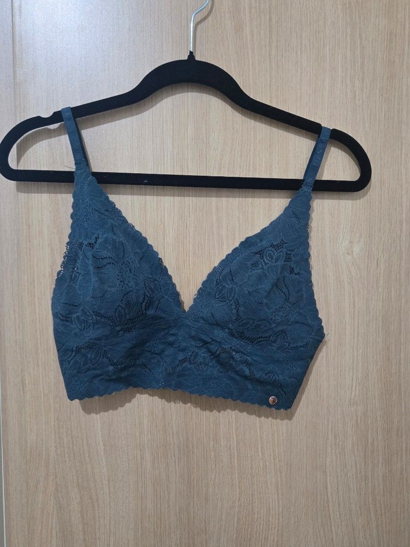 Danskin Teal Lace Bralette Size M (Category: Undergarments & Loungewear) located in Pasay City. Submitted by samcas (Listing ID 1470268758, Image 1). Description: - Brand: Danskin - Size: Medium - Color: Teal - Material/Design: Soft floral lace pattern - Straps: Adjustable branded straps with rose gold hardware - Details: Small round metal logo tag on the left cup - Closure: Hook-and-eye closure at the back.
