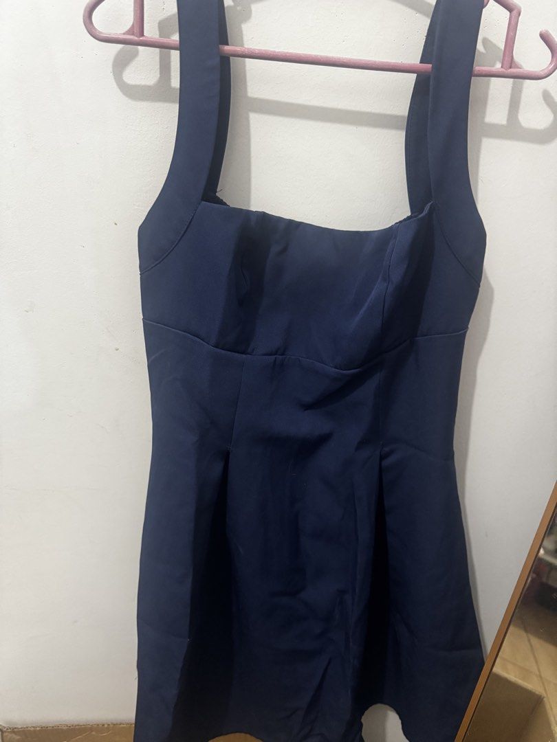 Dark Blue Square Neck Mini Dress (Category: Dresses) located in Marikina City. Submitted by potchayy (Listing ID 1470263914, Image 1). Description: - Color: Dark Blue / Solid Navy - Style: Sleeveless dress with square neckline and flared skirt - Fit: Fitted bodice with subtle shirring at the back edge for added comfort - Closure: Secure back zipper - Versatility: Perfect for casual day outs, dates, or brunch with the girls - Condition: Excellent,