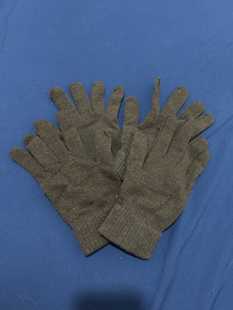 Dark brown knit winter gloves (Category: Gloves) located in Makati City. Submitted by aizy_sell (Listing ID 1470266407, Image 3). Description: - Color: Dark brown - Material: Soft woven knit texture - Features: Ribbed cuffs to keep out the cold - Fit: Flexible and comfortable - Style: Simple everyday winter wear Used once..