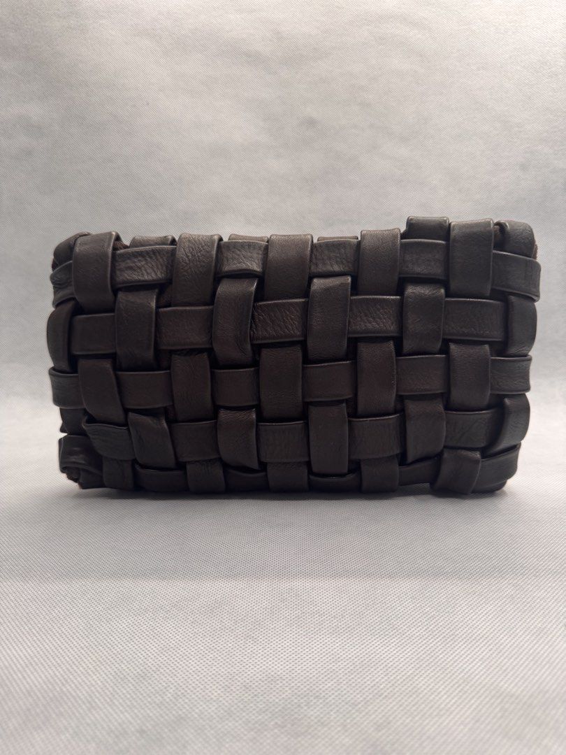 Dark Brown Woven Leather Clutch Bag (Category: Clutches) located in Las Pinas. Submitted by uynice.ph (Listing ID 1470251365, Image 1). Description: 🤎 BIG WEAVE CLUTCH | Distressed Italian Leather Effortlessly chic with a beautifully textured, woven design. Crafted from distressed leather for that soft, lived-in look with natural variations that give each piece its own character. ✨ Bag Details * Material: Genuine distressed leather * Color: Dark
