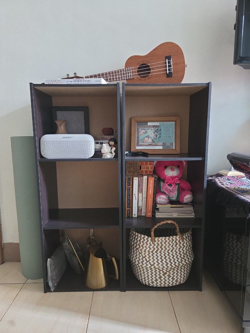 Dark Wood 6-Cube Storage Shelf Organizer (Category: Shelves, Cabinets & Racks) located in Makati City. Submitted by shoppreloved_ (Listing ID 1470181055, Image 1). Description: - two open shelf units - contents not included - Dark brown wooden finish - each feature 3 spacious compartments for books, decor, or storage baskets - Clean, modern lines that fit living rooms or bedrooms - Condition: Minor signs of wear on the panels 500 for both for pic