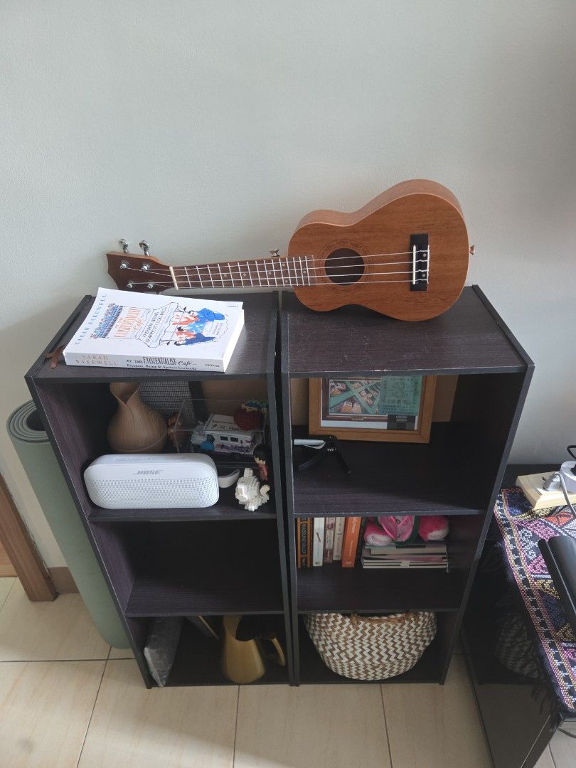 Dark Wood 6-Cube Storage Shelf Organizer (Category: Shelves, Cabinets & Racks) located in Makati City. Submitted by shoppreloved_ (Listing ID 1470181055, Image 2). Description: - two open shelf units - contents not included - Dark brown wooden finish - each feature 3 spacious compartments for books, decor, or storage baskets - Clean, modern lines that fit living rooms or bedrooms - Condition: Minor signs of wear on the panels 500 for both for pic