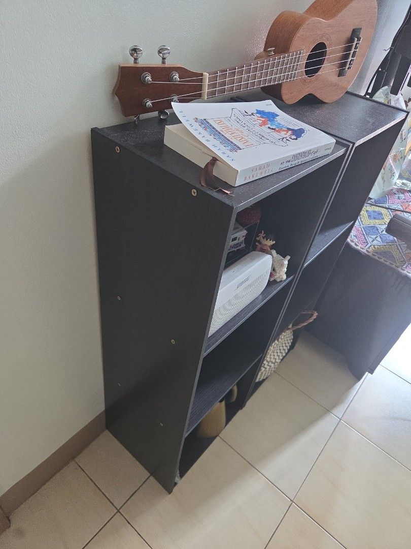 Dark Wood 6-Cube Storage Shelf Organizer (Category: Shelves, Cabinets & Racks) located in Makati City. Submitted by shoppreloved_ (Listing ID 1470181055, Image 3). Description: - two open shelf units - contents not included - Dark brown wooden finish - each feature 3 spacious compartments for books, decor, or storage baskets - Clean, modern lines that fit living rooms or bedrooms - Condition: Minor signs of wear on the panels 500 for both for pic