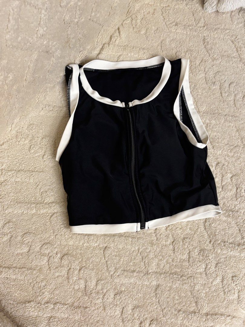 Dazy Black and White Zip Front Bikini Set Size S (Category: Bikinis & Swimsuits) located in Quezon City. Submitted by lovedbysloane (Listing ID 1470208485, Image 3). Description: - Brand: Dazy - Style: Two-piece bikini set with sporty zip-front crop top and high-waisted bottoms - Color: Black with white trim - Size: Small (tag attached) - Material: Stretchy and comfortable - Condition: Brand new - Perfect for: Beach trips, pool days, and vacation