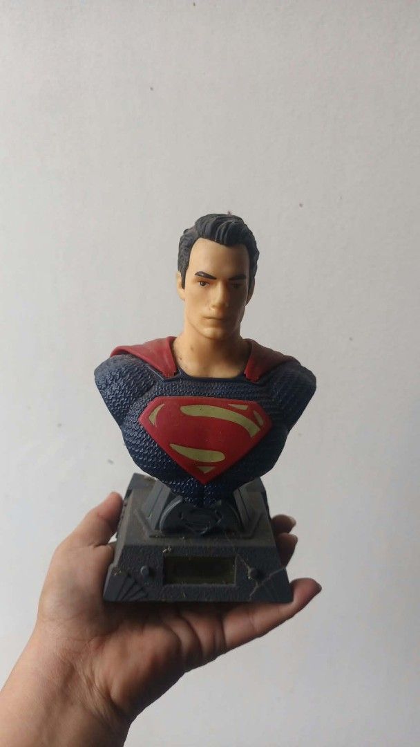 DC Comics Superman Bust Figurine Statue Desk Display (Category: Figurines & Statues) located in Mandaluyong City. Submitted by LEATHERFACE (Listing ID 1470157251, Image 1). Description: - Official movie-accurate Henry Cavill Superman bust figure - Detailed textured suit with the classic red and yellow chest shield - Mounted on a sturdy dark grey base featuring a digital display panel slot - Solid plastic construction that stands upright easily on