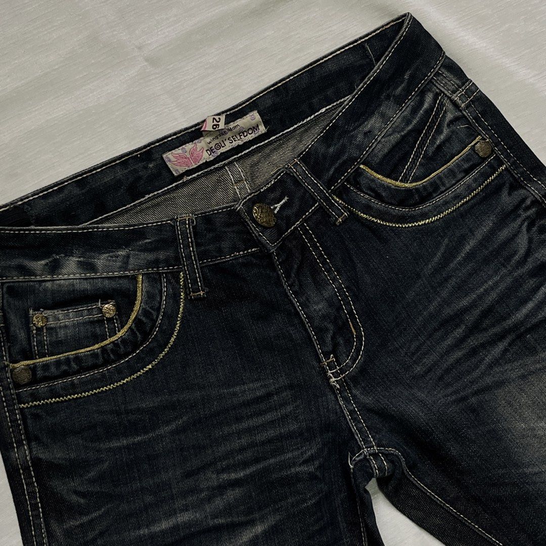 DEGLI SELFDOM Dark Wash Jeans Size 26 (Category: Jeans) located in Dasmarinas. Submitted by minx203 (Listing ID 1470299469, Image 3). Description: - Brand: DEGLI SELFDOM - Style: Flare leg cut in a dark wash - Details: Whiskered front thighs and contrast golden-yellow stitching - Hardware: Metal buttons on fly and front pockets - Size: 26.