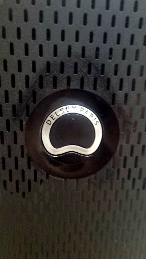 Delsey Paris Black Blue Spinner Suitcase Hard Shell (Category: Luggage) located in Mandaluyong City. Submitted by jomont (Listing ID 1470169029, Image 3). Description: - Brand: Delsey Paris - Color: Black with bold blue accents - Size: Ideal for weekend trips and carry-on travel - Mobility: 4 smooth-rolling wheels and a smooth telescoping handle - Security: Built-in combination lock for main zippers - Design: Durable hard shell with a perforated 