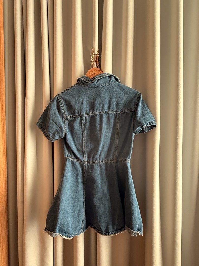 Denim Mini Dress Button Front Flared Skirt (Category: Dresses) located in Makati City. Submitted by regalbbb (Listing ID 1470218952, Image 2). Description: Original Price: Around 700 RFS: Decluttering Condition: Never used. Shein sizes run big so xs is really more small. - Style: Casual short sleeve denim dress with a flared skater skirt - Design: Front button placket, chest pockets, and fitted waistline with panel details - Color: Mid blue wash 