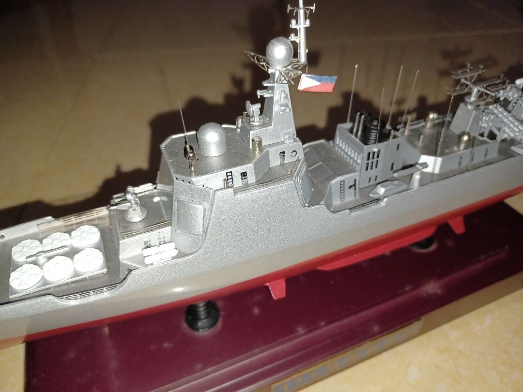 Detailed Warship Model with Display Stand (Category: Action & Battle Toys) located in Santa Rosa. Submitted by rheitan (Listing ID 1470144865, Image 2). Description: - Detailed plastic warship model (Hull No. 171) - Painted grey hull with realistic red bottom - Intricate deck features including radar masts, missile launchers, and a miniature helicopter - Pre-assembled and painted to a high standard - Mounted on a polished wooden display stand wit