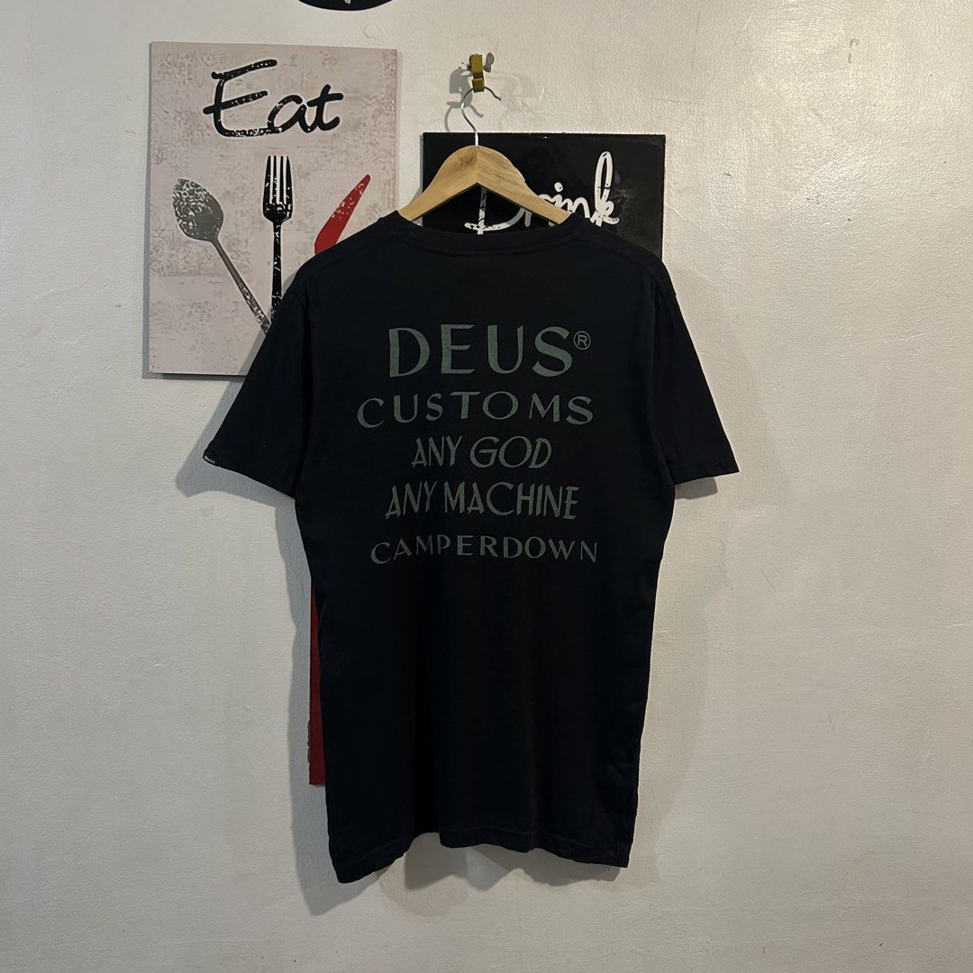 Deus Ex Machina Crimson Tee Black Size S (Category: Tshirts & Polo Shirts ) located in Manila. Submitted by jakes_thrift_shop (Listing ID 1470310391, Image 2). Description: - Brand: Deus Ex Machina - Color: Black - Size: S (Tag attached) - Material: 100% Cotton - Design: Small chest logo & bold 'Deus Customs Camperdown' back graphic - Fit: Standard short sleeve - Condition: Brand new / Excellent.
