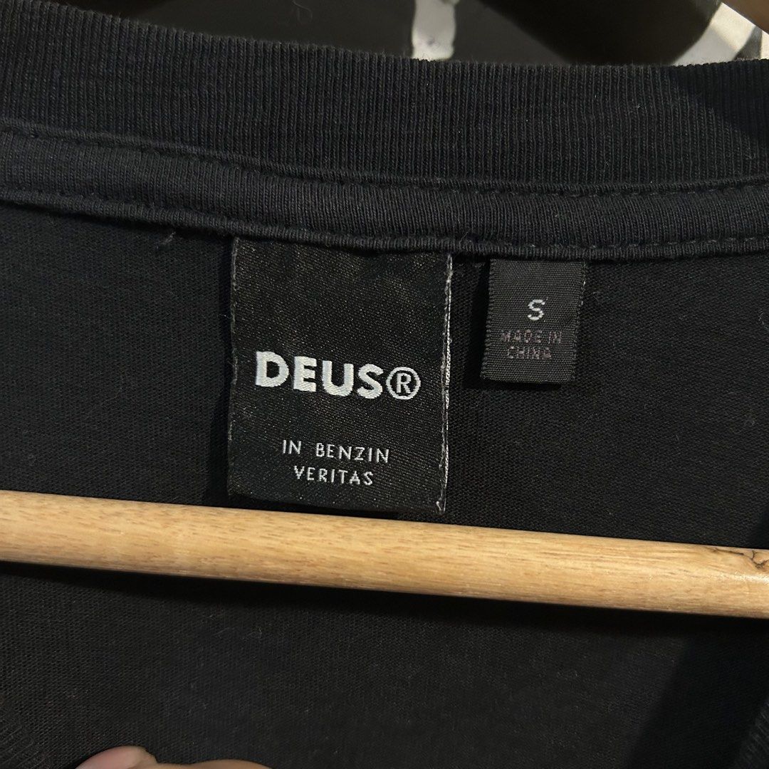 Deus Ex Machina Crimson Tee Black Size S (Category: Tshirts & Polo Shirts ) located in Manila. Submitted by jakes_thrift_shop (Listing ID 1470310391, Image 3). Description: - Brand: Deus Ex Machina - Color: Black - Size: S (Tag attached) - Material: 100% Cotton - Design: Small chest logo & bold 'Deus Customs Camperdown' back graphic - Fit: Standard short sleeve - Condition: Brand new / Excellent.