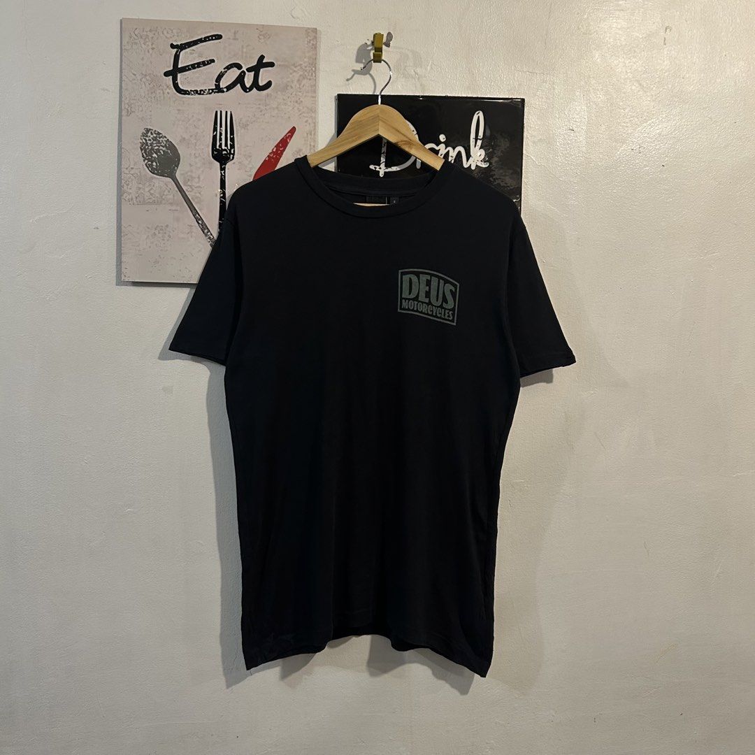Deus Ex Machina Crimson Tee Black Size S (Category: Tshirts & Polo Shirts ) located in Manila. Submitted by jakes_thrift_shop (Listing ID 1470310391, Image 1). Description: - Brand: Deus Ex Machina - Color: Black - Size: S (Tag attached) - Material: 100% Cotton - Design: Small chest logo & bold 'Deus Customs Camperdown' back graphic - Fit: Standard short sleeve - Condition: Brand new / Excellent.