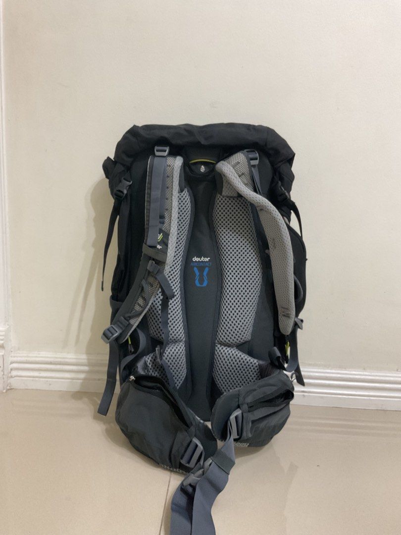Deuter Trail Pro 36 Hiking Backpack (Category: Backpacks) located in Makati City. Submitted by 24chickenvampire (Listing ID 1470323147, Image 2). Description: - Brand/Model: Deuter Trail Pro 36 hiking backpack - Color: Black with neon yellow accents - Comfort: Aircontact back system for long trails and fully adjustable straps - Accessibility: Side zipper access and convenient hip belt pockets - Safety: Built-in emergency signals printed inside th