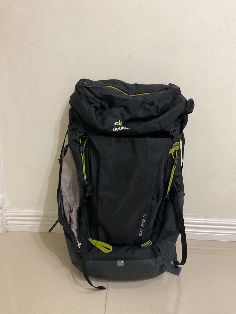 Deuter Trail Pro 36 Hiking Backpack (Category: Backpacks) located in Makati City. Submitted by 24chickenvampire (Listing ID 1470323147, Image 1). Description: - Brand/Model: Deuter Trail Pro 36 hiking backpack - Color: Black with neon yellow accents - Comfort: Aircontact back system for long trails and fully adjustable straps - Accessibility: Side zipper access and convenient hip belt pockets - Safety: Built-in emergency signals printed inside th