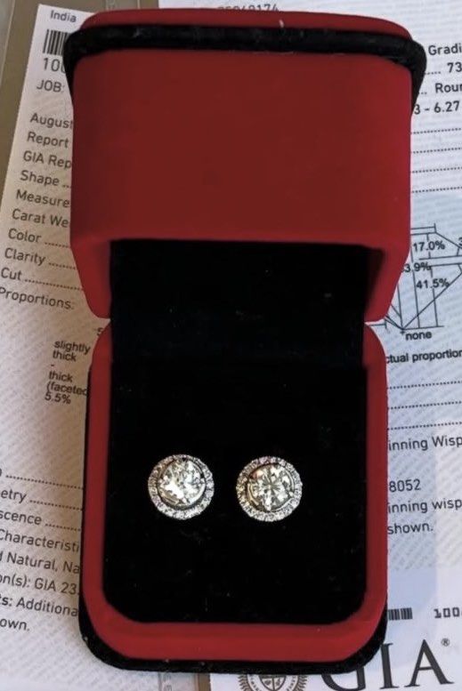 Diamond Solitaire Stud Earrings with Removable Halo Jackets (Category: Earrings) located in Muntinlupa City. Submitted by jyrys (Listing ID 1470259309, Image 1). Description: 2.0ct total weight (1.0ct each) round brilliant cut natural diamond studs Mounted in 14k white gold with secure push backs Includes removable pavé diamond jackets for 2 distinct styles (solitaire or halo) Comes with presentation box and official GIA grading report Diamond st