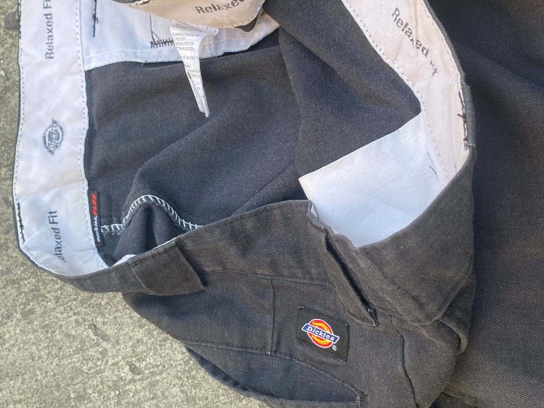 Dickies Relaxed Fit Flex Work Shorts Black (Category: Shorts) located in Manila. Submitted by raquimsyt (Listing ID 1470233737, Image 3). Description: - Brand: Dickies - Color: Black - Fit: Relaxed fit with stretchy inner waistband - Condition: Clean overall with minimal signs of use - Features: Classic logo patch, standard back welt pockets, side leg pocket, and secure button/zip fly - Durability: Sturdy construction built for daily wear.