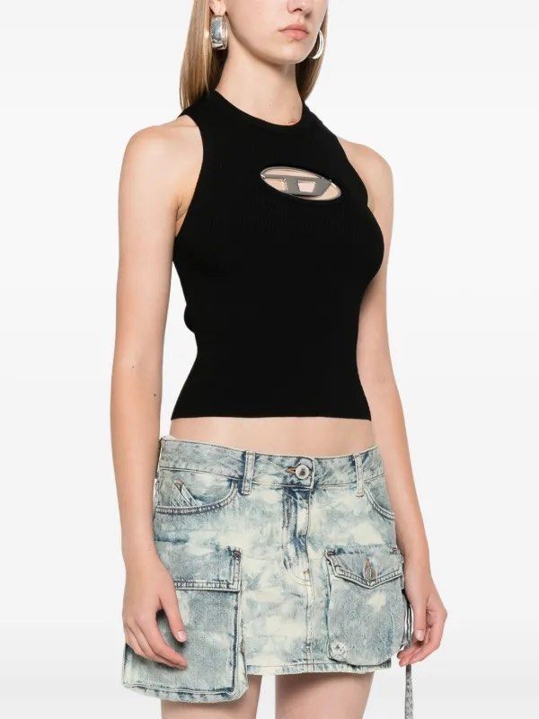 Black Sleeveless Ribbed Knit Top With Logo (Category: Sleeveless) located in Las Pinas. Submitted by michywoop (Listing ID 1470322100, Image 1). Description: - Style: Sleeveless ribbed knit top with high neckline and fitted silhouette - Detail: Iconic large silver Diesel oval logo hardware on the chest - Material: Soft knit with great stretch for a comfortable fit - Condition: Clean and well-maintained - Shipping & Meetups: Ships fast from the Ph