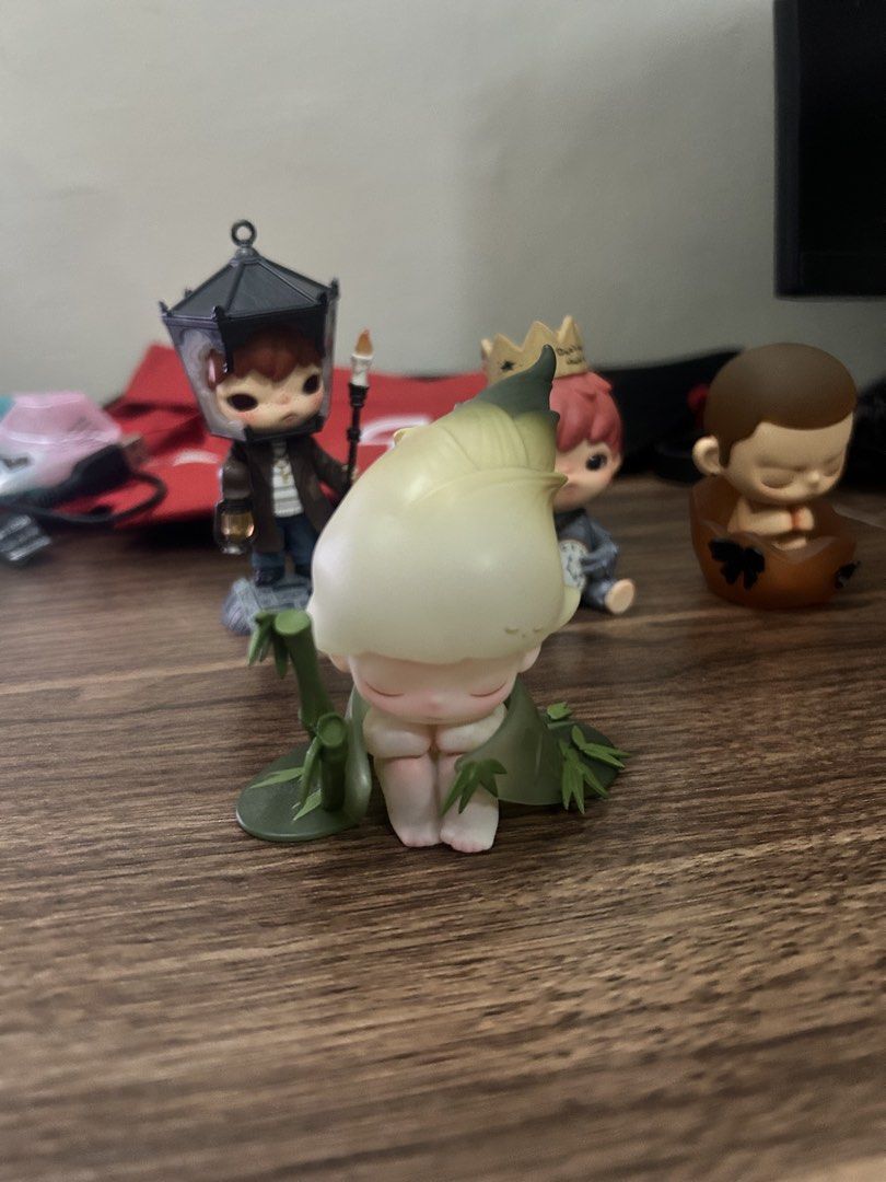 Dimoo Bamboo Shoot Forest Night Series Blind Box Figure (Category: Designer & Blind Box Toys) located in Manila. Submitted by mihos.garage.sale (Listing ID 1470187354, Image 1). Description: - Authentic Pop Mart Dimoo Forest Night Series: Bamboo Shoot figure - Design features a lovely green translucent cloak and bamboo stalk detail - Condition: Adult-owned, displayed strictly on a shelf away from direct sunlight - Inclusion: Figure only (Please n