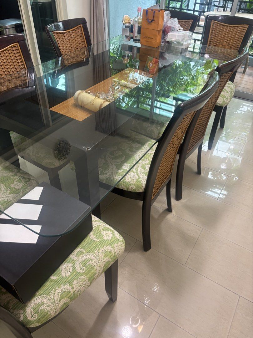 Dining Table (Category: Tables & Sets) located in Singapore. Submitted by fgf2974 (Listing ID 1470210947, Image 2). Description: Well kept 8 seater large dining table with plush cushion chairs. Chair seating Cloth from Jim Thompson. 198cm * 99cm * 76cm ht .