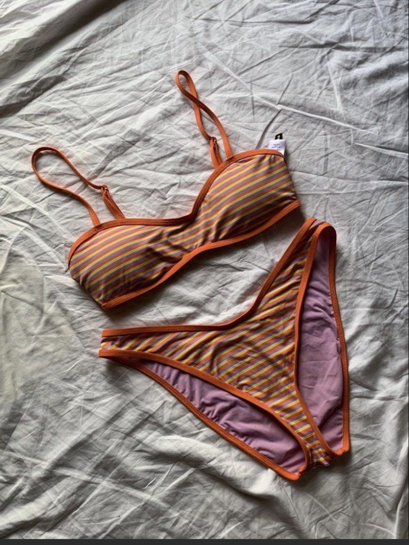 Dippin’ Daisy’s Stripe Bikini Set (Category: Bikinis & Swimsuits) located in Taguig. Submitted by prelovedbynette (Listing ID 1470317226, Image 1). Description: For size, pls refer to the size chart from the brand’s official website (see last photo) Top is size S with adjustable straps Bottom is size M With minimal stain at the back of the top (see 7th photo) Set retails for 6-7k Helping tags: Blackbough, H&M, Eight Mermaid.
